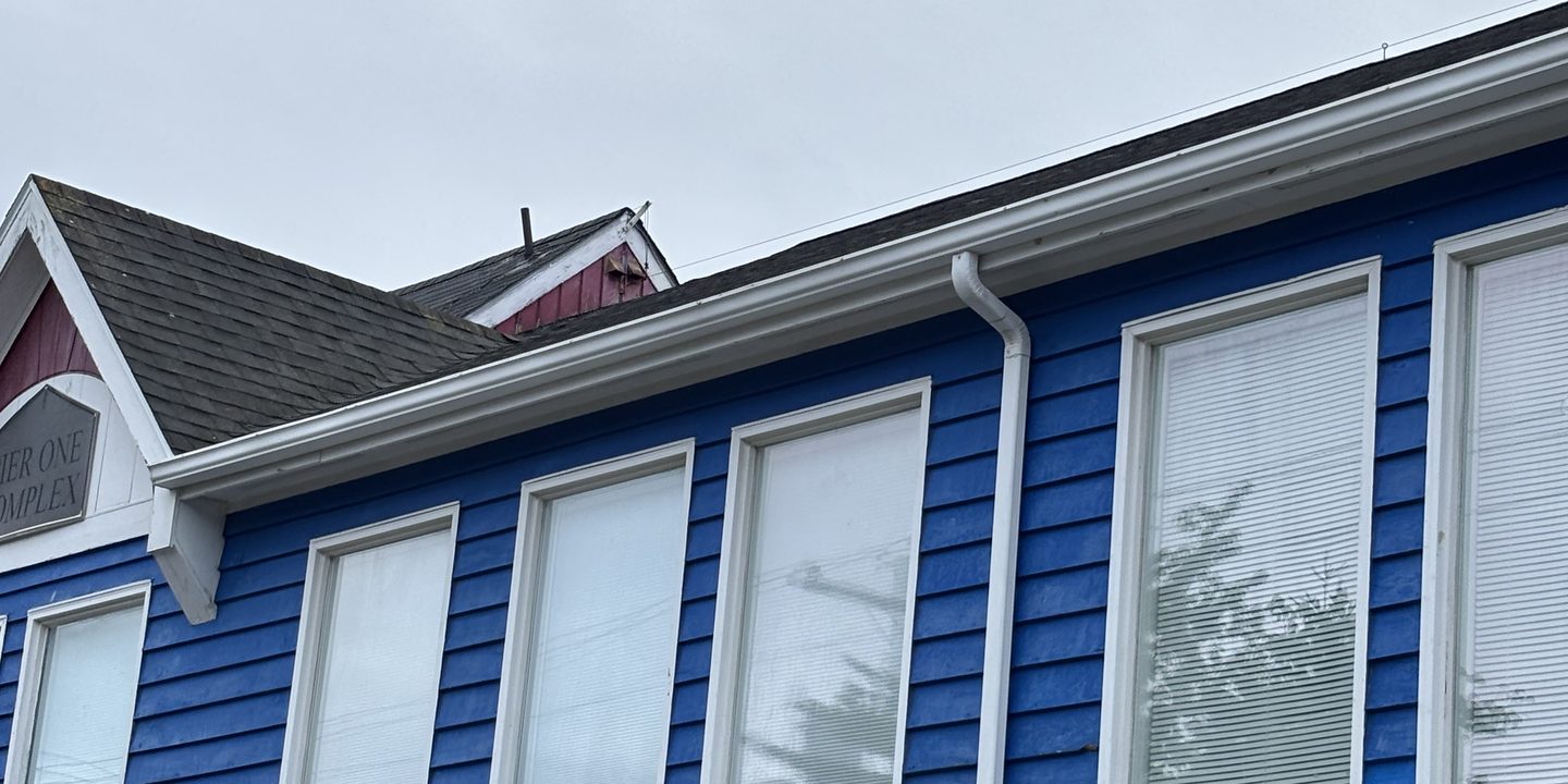 The long gutter run across the front of Pier One after cleaning